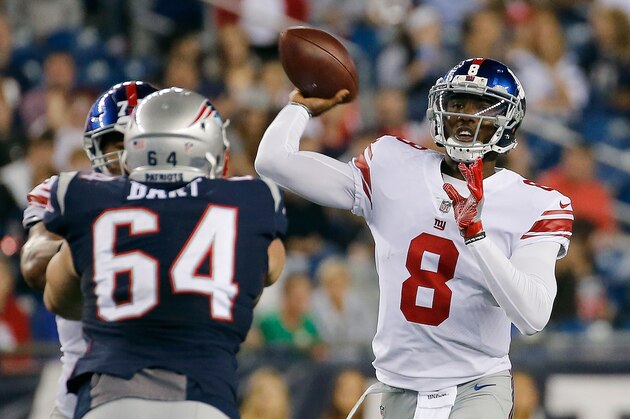 FOXBORO, MA - AUGUST 31: Josh Johnson #8 of the New York Giants throws over Michael Bart #64 of the New England Patriots in the first half during a preseason game at Gillette Stadium on August 31, 2017 in Foxboro, Massachusetts. (Photo by Jim Rogash/Getty Images)