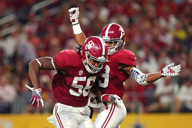 ARLINGTON, TX - SEPTEMBER 3: Tim Williams #56 and Minkah Fitzpatrick #29 of the Alabama Crimson Tide celebrate against the USC Trojans in the first half during the AdvoCare Classic at AT&T Stadium on September 3, 2016 in Arlington, Texas. (Photo by Tom Pennington/Getty Images)