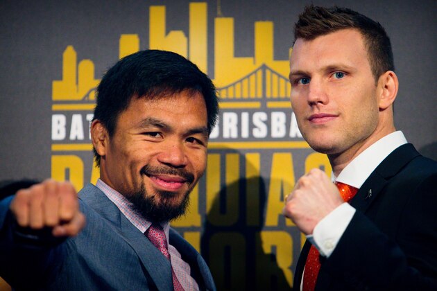 Philippine boxer Manny Pacquiao (L) and Australian challenger Jeff Horn pose after a press conference to promote their upcoming WBO welterweight boxing title fight at Suncorp Stadium in Brisbane on June 28, 2017.
Manny Pacquiao's world title fight with Jeff Horn will be 'short and sweet' with a knockout likely, his trainer predicted on June 28, as his Australian challenger said he was 'ready for war'.  / AFP PHOTO / Patrick HAMILTON / -- IMAGE RESTRICTED TO EDITORIAL USE - STRICTLY NO COMMERCIAL USE --        (Photo credit should read PATRICK HAMILTON/AFP/Getty Images)