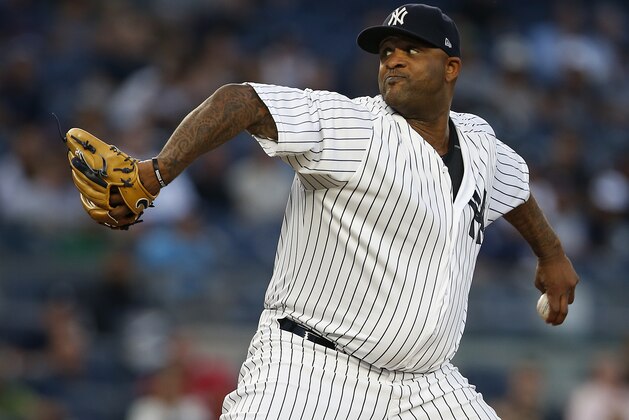 NEW YORK, NY - AUGUST 31: Pitcher CC Sabathia #52 of the New York Yankees delivers a pitch against the Boston Red Sox during the first inning of a game at Yankee Stadium on August 31, 2017 in the Bronx borough of New York City. (Photo by Rich Schultz/Getty Images)