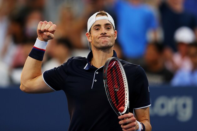 NEW YORK, NY - AUGUST 30: John Isner of the United States celebrates defeating Hyeon Chung of Korea in their second round Men's Singles match on Day Three of the 2017 US Open at the USTA Billie Jean King National Tennis Center on August 30, 2017 in the Flushing neighborhood of the Queens borough of New York City.  (Photo by Richard Heathcote/Getty Images)