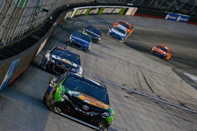 BRISTOL, TN - AUGUST 19:  Martin Truex Jr., driver of the #78 Bass Pro Shops/Ducks Unlimited Toyota, leads a pack of cars during the Monster Energy NASCAR Cup Series Bass Pro Shops NRA Night Race at Bristol Motor Speedway on August 19, 2017 in Bristol, Tennessee.  (Photo by Sean Gardner/Getty Images)