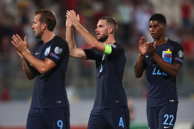 VALLETTA, MALTA - SEPTEMBER 01:  Harry Kane, Jordan Henderson and Marcus Rashford of England applaud the travelling fans after the FIFA 2018 World Cup Qualifier between Malta and England at Ta'Qali National Stadium on September 1, 2017 in Valletta, Malta.  (Photo by Julian Finney/Getty Images)