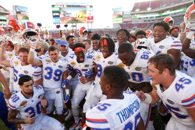 TAMPA, FL - JANUARY 2:  The Florida Gators celebrate their 30-3 win over the Iowa Hawkeyes at the conclusion of the Outback Bowl NCAA college football game on January 2, 2017 at Raymond James Stadium in Tampa, Florida. (Photo by Brian Blanco/Getty Images)