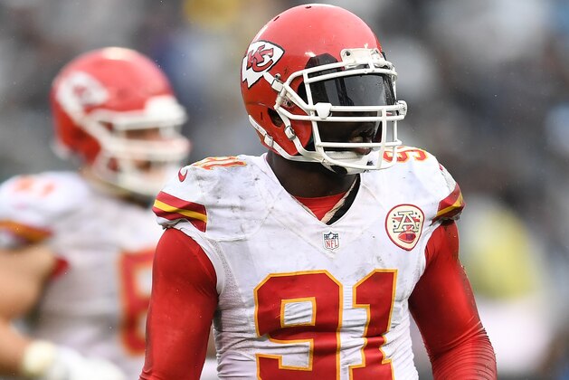 OAKLAND, CA - OCTOBER 16:  Tamba Hali #91 of the Kansas City Chiefs reacts after recovering a fumble against the Oakland Raiders during an NFL football game at Oakland-Alameda County Coliseum on October 16, 2016 in Oakland, California.  (Photo by Thearon W. Henderson/Getty Images)