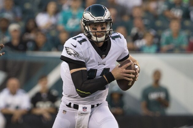 PHILADELPHIA, PA - AUGUST 24: Carson Wentz #11 of the Philadelphia Eagles looks to pass the ball against the Miami Dolphins in the preseason game at Lincoln Financial Field on August 24, 2017 in Philadelphia, Pennsylvania. The Eagles defeated the Dolphins 38-31. (Photo by Mitchell Leff/Getty Images)