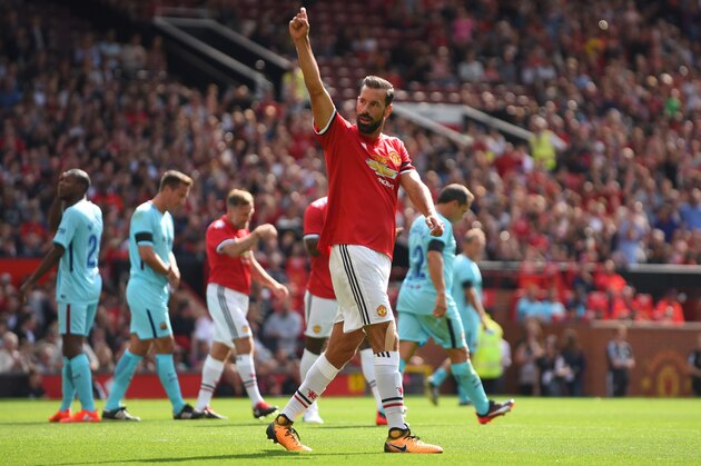 MANCHESTER, ENGLAND - SEPTEMBER 02: Ruud Van Nistelrooy of Manchester United Legends celebrates after scoring the first goal during the match between Manchester United Legends and FC Barcelona Legends at Old Trafford on September 2, 2017 in Manchester, England. (Photo by Nathan Stirk/Getty Images)