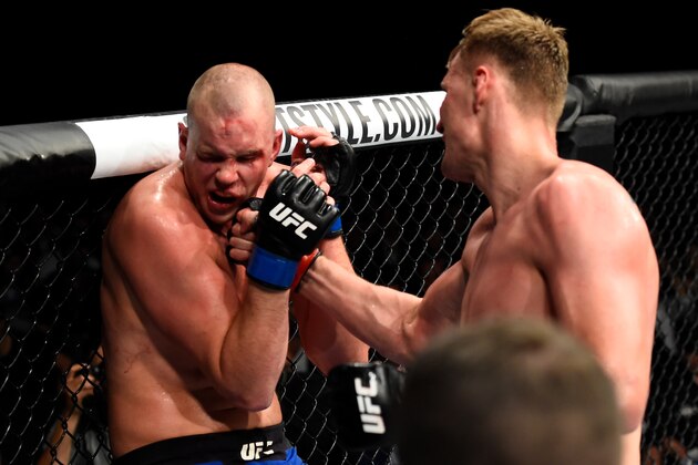 ROTTERDAM, NETHERLANDS - SEPTEMBER 02:  (R-L) Alexander Volkov of Russia punches Stefan Struve of The Netherlands in their heavyweight bout during the UFC Fight Night event at the Rotterdam Ahoy on September 2, 2017 in Rotterdam, Netherlands. (Photo by Josh Hedges/Zuffa LLC/Zuffa LLC via Getty Images)