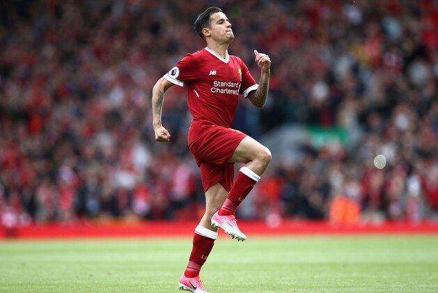 LIVERPOOL, ENGLAND - MAY 21:  Philippe Coutinho of Liverpool celebrates scoring his sides second goal during the Premier League match between Liverpool and Middlesbrough at Anfield on May 21, 2017 in Liverpool, England.  (Photo by Jan Kruger/Getty Images)