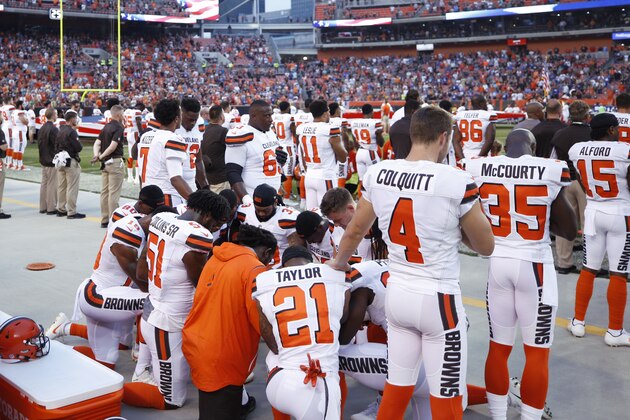 CLEVELAND, OH - AUGUST 21: A group of Cleveland Browns players kneel in a circle in protest during the national anthem before a preseason game against the New York Giants at FirstEnergy Stadium on August 21, 2017 in Cleveland, Ohio. (Photo by Joe Robbins/Getty Images) *** Local Caption ***