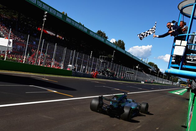 MONZA, ITALY - SEPTEMBER 03:  Lewis Hamilton of Great Britain driving the (44) Mercedes AMG Petronas F1 Team Mercedes F1 WO8 crosses the line to take the win during the Formula One Grand Prix of Italy at Autodromo di Monza on September 3, 2017 in Monza, Italy.  (Photo by Clive Rose/Getty Images)