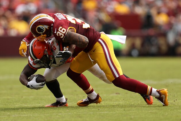 LANDOVER, MD - OCTOBER 2: Running back George Atkinson #25 of the Cleveland Browns is tackled by defensive back Su'a Cravens #36 of the Washington Redskins in the second quarter at FedExField on October 2, 2016 in Landover, Maryland. (Photo by Patrick Smith/Getty Images)