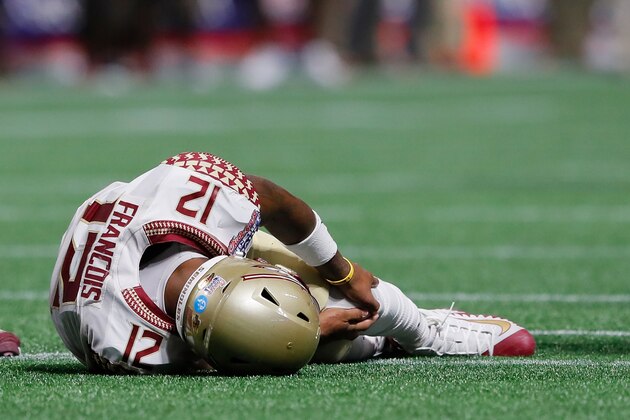 ATLANTA, GA - SEPTEMBER 02:  Deondre Francois #12 of the Florida State Seminoles hold his left leg after being injured in the fourth quarter of their game against the Alabama Crimson Tide at Mercedes-Benz Stadium on September 2, 2017 in Atlanta, Georgia.  (Photo by Kevin C. Cox/Getty Images)