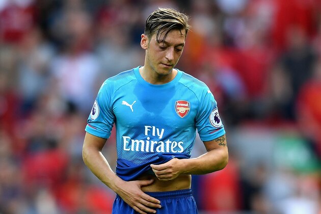 LIVERPOOL, ENGLAND - AUGUST 27:  Mesut Ozil of Arenal is dejected after the Premier League match between Liverpool and Arsenal at Anfield on August 27, 2017 in Liverpool, England.  (Photo by Michael Regan/Getty Images)