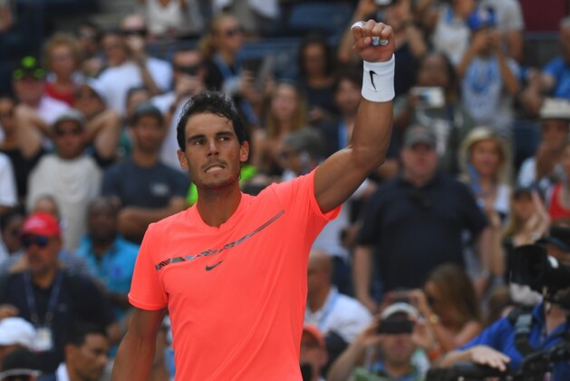 Rafael Nadal of Spain celebrates his victory over Alexandr Dolgopolov of Ukraine during their Round 4, US Open 2017, Men's Singles match at the USTA Billie Jean King National Tennis Center on September 4, 2017, in New York.
Nadal advanced to the US Open quarterfinals, winning 6-2, 6-4, 6-1. / AFP PHOTO / TIMOTHY A. CLARY        (Photo credit should read TIMOTHY A. CLARY/AFP/Getty Images)
