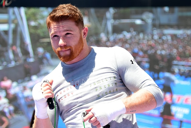 LOS ANGELES, CA - AUGUST 28:  Canelo Alvarez prepares to jump rope during a media workout at L.A. Live's Microsoft Square on August 28, 2017 in Los Angeles, California.  (Photo by Harry How/Getty Images)
