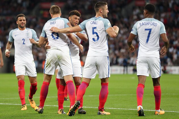 LONDON, ENGLAND - SEPTEMBER 04: Eric Dier of England celebrates with his team mates after scoring a goal to make it 1-1 during the FIFA 2018 World Cup Qualifier between England and Slovakia at Wembley Stadium on September 4, 2017 in London, England. (Photo by James Baylis - AMA/Getty Images)