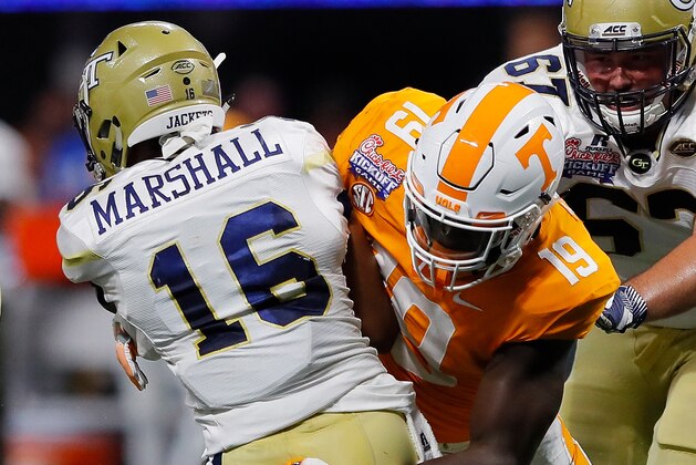 ATLANTA, GA - SEPTEMBER 04:  Darrell Taylor #19 of the Tennessee Volunteers sacks TaQuon Marshall #16 of the Georgia Tech Yellow Jackets at Mercedes-Benz Stadium on September 4, 2017 in Atlanta, Georgia.  (Photo by Kevin C. Cox/Getty Images)