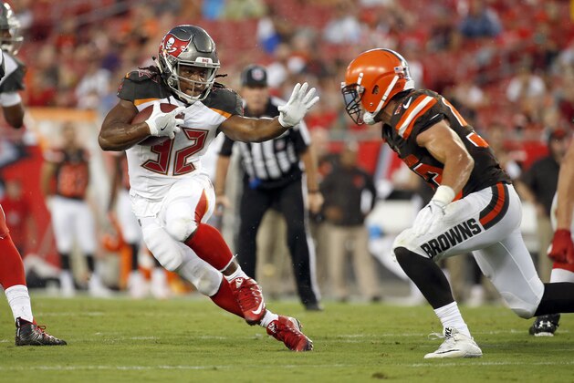 Aug 26, 2017; Tampa, FL, USA; Tampa Bay Buccaneers running back Jacquizz Rodgers (32) runs with the ball as Cleveland Browns outside linebacker Joe Schobert (53) defends during the first quarter at Raymond James Stadium. Mandatory Credit: Kim Klement-USA TODAY Sports