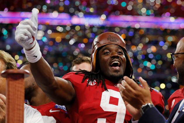 ATLANTA, GA - SEPTEMBER 02:  Bo Scarbrough #9 of the Alabama Crimson Tide celebrates with the Chick-fil-A Kick-Off Game trophy after defeating the Florida State Seminoles 24-7 in their game at Mercedes-Benz Stadium on September 2, 2017 in Atlanta, Georgia.  (Photo by Kevin C. Cox/Getty Images)