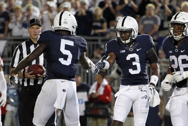 STATE COLLEGE, PA - SEPTEMBER 19:  DeAndre Thompkins #3 of the Penn State Nittany Lions celebrates with DaeSean Hamilton #5 after rushing for a 2-yard touchdown in the second quarter during the game against the Rutgers Scarlet Knights on September 19, 2015 at Beaver Stadium in State College, Pennsylvania.  (Photo by Justin K. Aller/Getty Images)