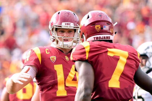 LOS ANGELES, CA - SEPTEMBER 02:  Sam Darnold #14 of the USC Trojans celebrates the touchdown of Steven Mitchell Jr. #7 to take a 28-21 lead during the fourth quarter at Los Angeles Memorial Coliseum on September 2, 2017 in Los Angeles, California.  (Photo by Harry How/Getty Images)