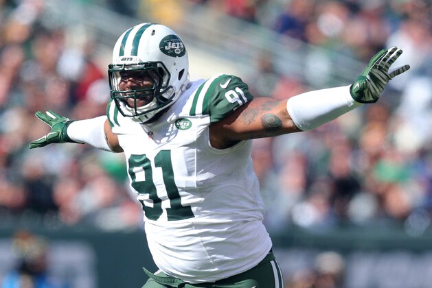 Oct 18, 2015; East Rutherford, NJ, USA; New York Jets defensive tackle Sheldon Richardson (91) celebrates after a sack against the Washington Redskins during the second quarter at MetLife Stadium. Mandatory Credit: Brad Penner-USA TODAY Sports