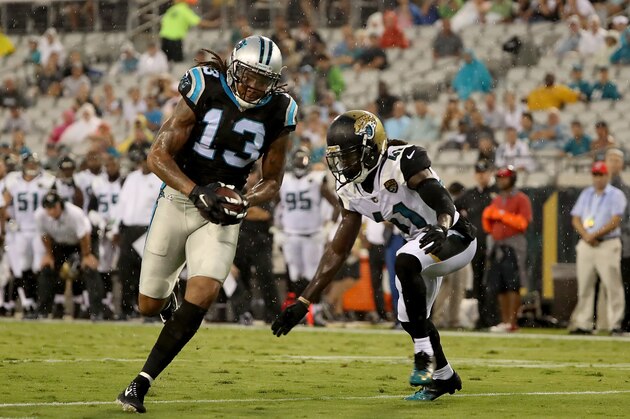 JACKSONVILLE, FL - AUGUST 24:  Tim Cook #41 of the Jacksonville Jaguars attempts to tackle Kelvin Benjamin #13 of the Carolina Panthers during a preseason game at EverBank Field on August 24, 2017 in Jacksonville, Florida.  (Photo by Sam Greenwood/Getty Images)