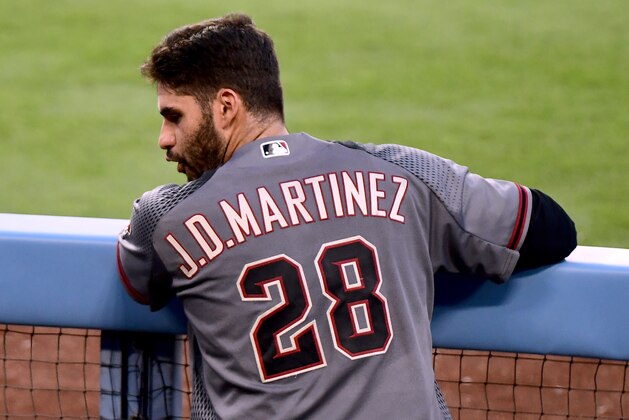 LOS ANGELES, CA - SEPTEMBER 04:  J.D. Martinez #28 of the Arizona Diamondbacks in the dugout after his second homerun of the game during the seventh inning against the Los Angeles Dodgers at Dodger Stadium on September 4, 2017 in Los Angeles, California.  (Photo by Harry How/Getty Images)