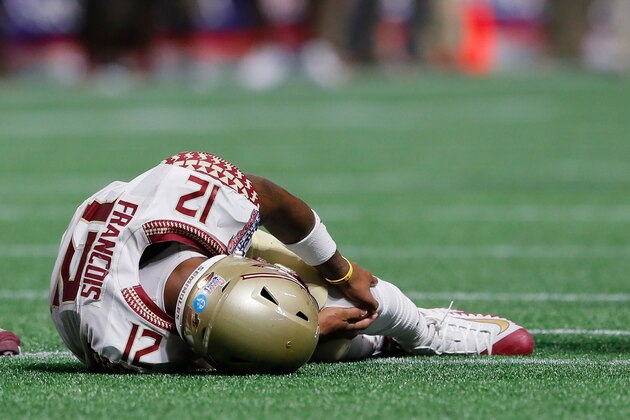 ATLANTA, GA - SEPTEMBER 02:  Deondre Francois #12 of the Florida State Seminoles hold his left leg after being injured in the fourth quarter of their game against the Alabama Crimson Tide at Mercedes-Benz Stadium on September 2, 2017 in Atlanta, Georgia.  (Photo by Kevin C. Cox/Getty Images)