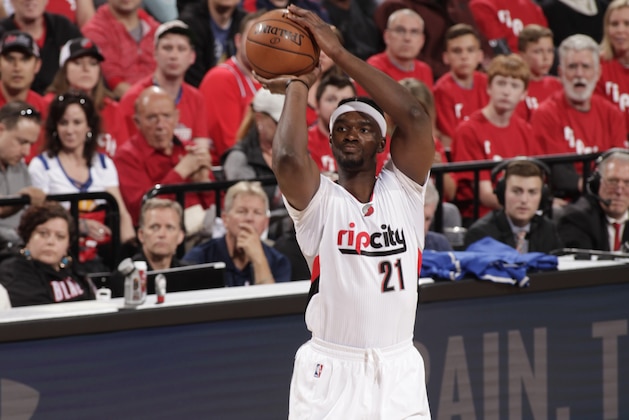 PORTLAND, OR - APRIL 22: Noah Vonleh #21 of the Portland Trail Blazers shoots the ball against the Golden State Warriors  in Game Three of the Western Conference Quarterfinals of the 2017 NBA Playoffs on April 22, 2017 at the Moda Center in Portland, Oregon. NOTE TO USER: User expressly acknowledges and agrees that, by downloading and or using this Photograph, user is consenting to the terms and conditions of the Getty Images License Agreement. Mandatory Copyright Notice: Copyright 2017 NBAE (Photo by Cameron Browne/NBAE via Getty Images)