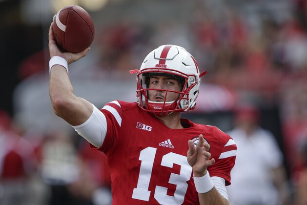 Nebraska quarterback Tanner Lee (13) warms up before an NCAA college football game against Arkansas State in Lincoln, Neb., Saturday, Sept. 2, 2017. (AP Photo/Nati Harnik)