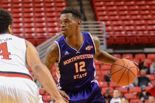 LUBBOCK, TX - NOVEMBER 25: Jalan West #12 of the Northwestern State Demons dribbles the ball while defended by Justin Jamison #4 of the Texas Tech Red Raiders during game action on November 25, 2014 at United Supermarkets Arena in Lubbock, Texas. (Photo by John Weast/Getty Images)