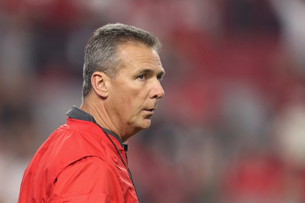 GLENDALE, AZ - DECEMBER 31:  Head coach Urban Meyer of the Ohio State Buckeyes watches warm ups prior to the 2016 PlayStation Fiesta Bowl against the Clemson Tigers at University of Phoenix Stadium on December 31, 2016 in Glendale, Arizona.  (Photo by Christian Petersen/Getty Images)
