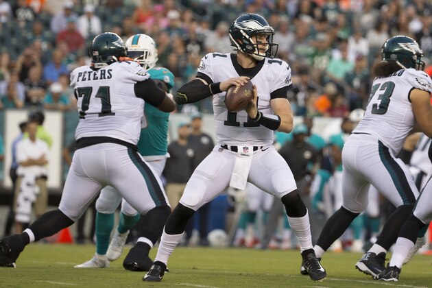 PHILADELPHIA, PA - AUGUST 24: Carson Wentz #11 of the Philadelphia Eagles looks to pass the ball against the Miami Dolphins in the preseason game at Lincoln Financial Field on August 24, 2017 in Philadelphia, Pennsylvania. The Eagles defeated the Dolphins 38-31. (Photo by Mitchell Leff/Getty Images)