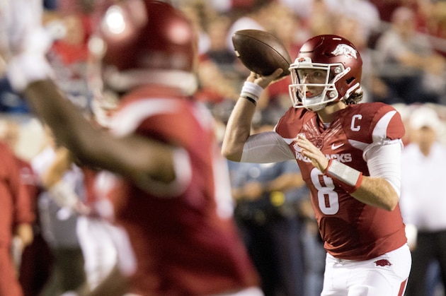 Arkansas quarterback Austin Allen, 8, throws the ball downfield during the first quarter of an NCAA college football game against Florida A&M on Thursday, Aug. 31, 2017, in Little Rock, Ark.. (AP Photo/Gareth Patterson)