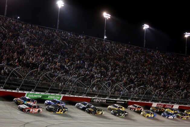 DARLINGTON, SC - SEPTEMBER 03:  Denny Hamlin, driver of the #11 Sport Clips Toyota, Kyle Busch, driver of the #18 M&M's Caramel Toyota, and Brad Keselowski, driver of the #2 Miller Genuine Draft Ford, lead the field during a restart during the Monster Energy NASCAR Cup Series Bojangles' Southern 500 at Darlington Raceway on September 3, 2017 in Darlington, South Carolina.  (Photo by Jerry Markland/Getty Images)