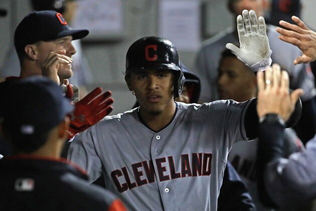 CHICAGO, IL - SEPTEMBER 07:   Erik Gonzalez #9 of the Cleveland Indians is congratulated in the dugout after hitting his second home run of the game in the 9th inning against the Chicago White Sox at Guaranteed Rate Field on September 7, 2017 in Chicago, Illinois. The Indians defeated the White Sox 11-2. (Photo by Jonathan Daniel/Getty Images)