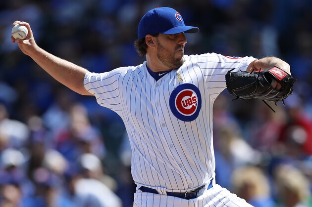 Chicago Cubs' John Lackey (41) pitches to the Atlanta Braves during the first inning of a baseball game Friday, Sept. 1, 2017, in Chicago. (AP Photo/Jim Young)