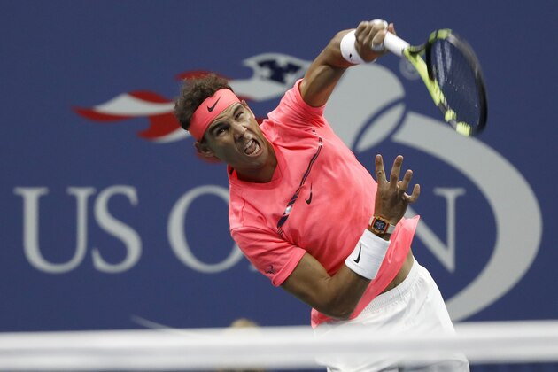 Rafael Nadal, of Spain, serves to Andrey Rublev, of Russia, during the quarterfinals of the U.S. Open tennis tournament, Wednesday, Sept. 6, 2017, in New York. (AP Photo/Adam Hunger)