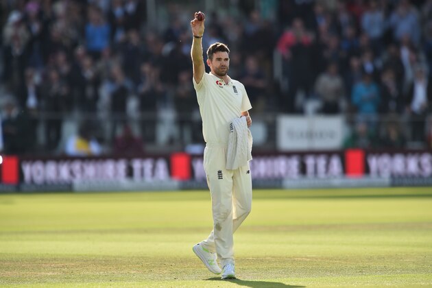 England's James Anderson holds up the ball as he celebrates taking his 500th Test match wicket during the second day of the third international Test match between England and West Indies at Lords cricket ground in London on September 8, 2017. / AFP PHOTO / Glyn KIRK / RESTRICTED TO EDITORIAL USE. NO ASSOCIATION WITH DIRECT COMPETITOR OF SPONSOR, PARTNER, OR SUPPLIER OF THE ECB         (Photo credit should read GLYN KIRK/AFP/Getty Images)