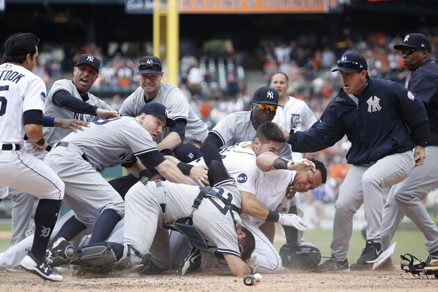 DETROIT, MI - AUGUST 24: Miguel Cabrera #24 of the Detroit Tigers fights with Austin Romine #27 of the New York Yankees after words were exchanged during a game at Comerica Park on August 24, 2017 in Detroit, Michigan. (Photo by Joe Robbins/Getty Images)