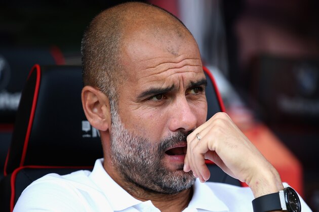 BOURNEMOUTH, ENGLAND - AUGUST 26:  Josep Guardiola, Manager of Manchester City looks on prior to the Premier League match between AFC Bournemouth and Manchester City at Vitality Stadium on August 26, 2017 in Bournemouth, England.  (Photo by Steve Bardens/Getty Images)