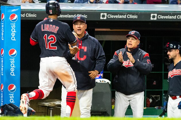 CLEVELAND, OH - SEPTEMBER 8: Francisco Lindor #12 celebrates with manager Terry Francona #17 and bench coach Brad Mills #2 of the Cleveland Indians after Lindor scored during the seventh inning against the Baltimore Orioles at Progressive Field on September 8, 2017 in Cleveland, Ohio. (Photo by Jason Miller/Getty Images)