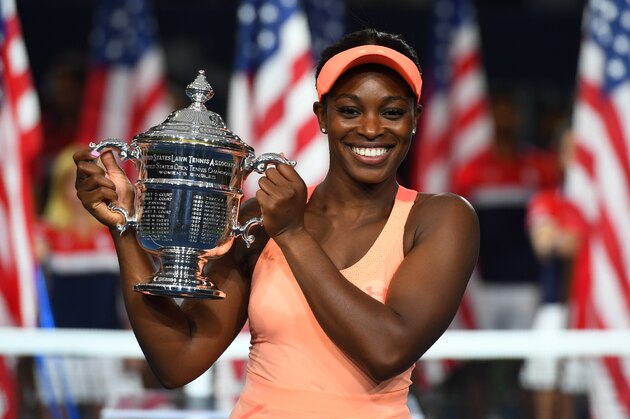 Sloane Stephens of the US celebrates with her winning trophy after defeating compatriot Madison Keys in their 2017 US Open Women's Singles final match at the USTA Billie Jean King National Tennis Center in New York on September 9, 2017. 
Sloane Stephens, sidelined for 11 months by a left foot injury until returning in July, captured her first Grand Slam title by routing fellow American Madison Keys 6-3, 6-0 in Saturday's US Open final. / AFP PHOTO / TIMOTHY A. CLARY        (Photo credit should read TIMOTHY A. CLARY/AFP/Getty Images)