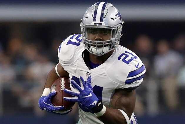 ARLINGTON, TX - SEPTEMBER 11:  Ezekiel Elliott #21 of the Dallas Cowboys rushes during the second half against the New York Giants at AT&T Stadium on September 11, 2016 in Arlington, Texas.  (Photo by Ronald Martinez/Getty Images)