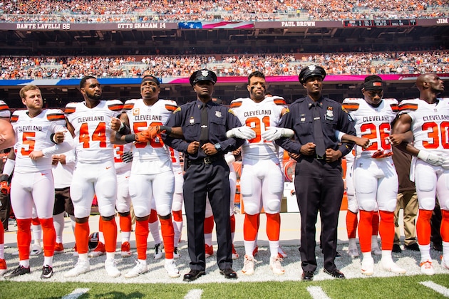 CLEVELAND, OH - SEPTEMBER 10: Members of the Cleveland Police join the Cleveland Browns on the sidelines during the National Anthem prior to the game against the Pittsburgh Steelers at FirstEnergy Stadium on September 10, 2017 in Cleveland, Ohio. (Photo by Jason Miller/Getty Images)