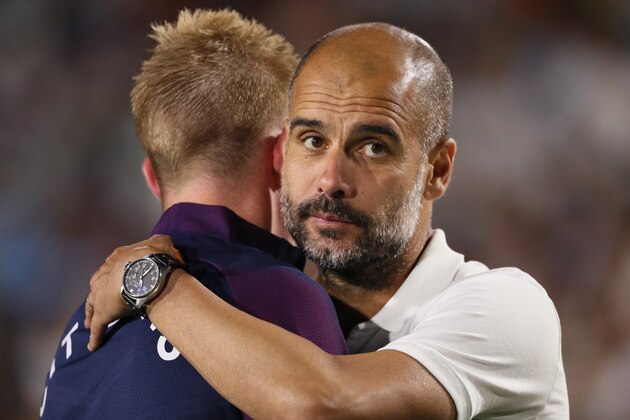 LOS ANGELES, CA - JULY 26: Kevin De Bruyne of Manchester City is congratulated on the victory by Pep Guardiola the head coach / manager of Manchester City during the International Champions Cup 2017 match between Manchester City and Real Madrid at Los Angeles Memorial Coliseum on July 26, 2017 in Los Angeles, California. (Photo by Matthew Ashton - AMA/Getty Images)