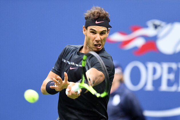 Spain's Rafael Nadal returns the ball to South Africa's Kevin Anderson during their 2017 US Open Men's Singles final match at the USTA Billie Jean King National Tennis Center in New York on September 10, 2017.  / AFP PHOTO / Jewel SAMAD        (Photo credit should read JEWEL SAMAD/AFP/Getty Images)