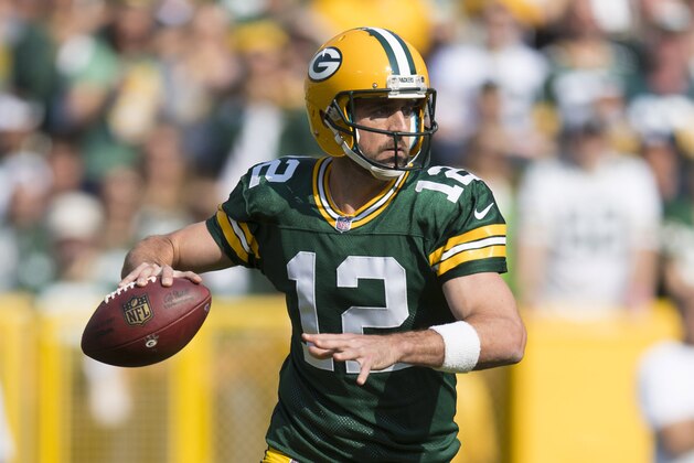 Sep 10, 2017; Green Bay, WI, USA; Green Bay Packers quarterback Aaron Rodgers (12) throws a pass during the first quarter against the Seattle Seahawks at Lambeau Field. Mandatory Credit: Jeff Hanisch-USA TODAY Sports